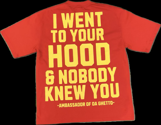 Red t-shirt with yellow text on the background